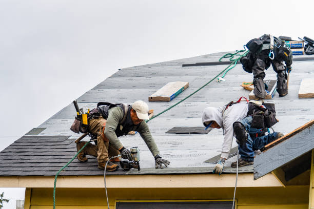Professional Gutter Installation technician working in Ashville, PA
